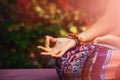 Closeup of woman hand in mudra gesture practice yoga meditation