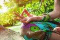 Closeup of woman hand in mudra gesture practice yoga sit on tree
