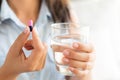 Closeup woman hand with pills medicine tablets Royalty Free Stock Photo