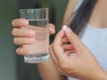 Closeup woman hand with pills medicine tablets Royalty Free Stock Photo