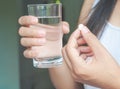 Closeup woman hand with pills medicine tablets Royalty Free Stock Photo