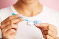 Closeup Of Woman Hands Holding White Eyelense Container Royalty Free Stock Photo