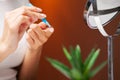 Closeup Of Woman Hands Holding White Eyelense Container Royalty Free Stock Photo