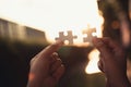 Closeup of woman hands joining pieces of jigsaw puzzle together.,Business solutions