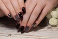 Closeup of woman hands with nail design. Royalty Free Stock Photo