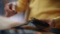 Closeup woman hands paying credit card over terminal at store. Client payment Royalty Free Stock Photo