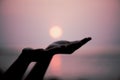 Closeup woman hands praying for blessing from god during sunset Royalty Free Stock Photo