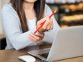 Closeup woman holding her wrist pain from using computer Royalty Free Stock Photo