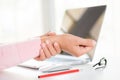 Closeup woman holding her wrist pain from using computer Royalty Free Stock Photo