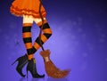 Closeup of woman legs in Halloween witch costume