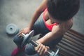 Closeup on woman lifting dumbbell Royalty Free Stock Photo