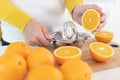 closeup on woman making orange juice Royalty Free Stock Photo