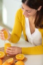 closeup on woman making orange juice Royalty Free Stock Photo