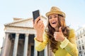 Closeup on woman making selfie in rome Royalty Free Stock Photo