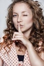 Closeup of woman making silent gesture