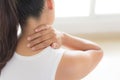 Closeup woman neck and shoulder pain and injury. Royalty Free Stock Photo