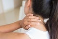 Closeup woman neck and shoulder pain and injury. Royalty Free Stock Photo