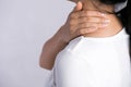 Closeup woman neck and shoulder pain and injury. Health care and medical concept Royalty Free Stock Photo