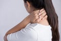 Closeup woman neck and shoulder pain and injury. Health care and medical concept Royalty Free Stock Photo