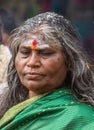 Closeup of woman at Pilgrim farewell ceremony, Belathur Karnataka India.