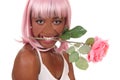 Closeup of woman with pink rose in mouth Royalty Free Stock Photo