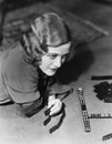 Closeup of woman playing dominos