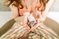 Closeup of woman`s hands holding crystalls stones in her hands Royalty Free Stock Photo