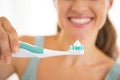 Closeup on woman showing electric toothbrush Royalty Free Stock Photo