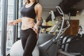 Closeup woman slim athlete using body fat measurement Royalty Free Stock Photo