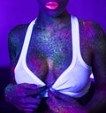 woman with UV fluorescent face and body makeup Royalty Free Stock Photo