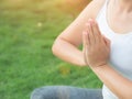 Closeup woman yoga with lotus hands in soft focus background Royalty Free Stock Photo