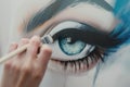 closeup of womans hand with brush on wall mural eye Royalty Free Stock Photo