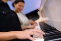 Closeup women playing piano duet Royalty Free Stock Photo