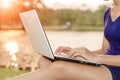 Closeup women use laptop computer outdoor