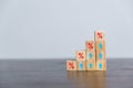 Closeup wood cubes with percentage symbol, Percent and upwards increasing arrows on wooden cubes. Financial interest mortgage