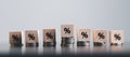 Closeup wood cubes with percentage symbol, Percent and upwards increasing arrows on wooden cubes. Financial interest mortgage