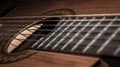 Closeup of brown wooden acoustic guitar. Royalty Free Stock Photo