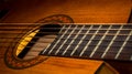 Closeup of wooden acoustic guitar. Royalty Free Stock Photo