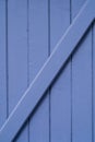 Closeup of wooden blue window shutter in France, useful as a background Royalty Free Stock Photo