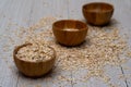 Closeup of a wooden bowl of oats