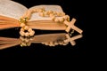 Closeup of wooden Christian cross on bible and prayer beads on black.Church utensils Royalty Free Stock Photo