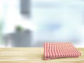 Closeup of wooden desk and tablecloth in room