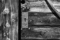 Closeup of a wooden door of a typical Alpine hut, Dolomite Alps in South Tirol