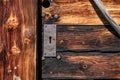 Closeup of a wooden door of a typical Alpine hut, Dolomite Alps in South Tirol