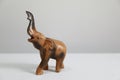 Closeup of a wooden elephant figurine isolated on a white background Royalty Free Stock Photo