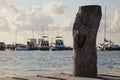 Closeup of wooden post on pier