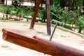 Closeup of a wooden seesaw part in an outdoor play garden