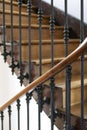 Closeup of wooden staircase railing in an old house Royalty Free Stock Photo