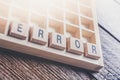 Closeup Of The Word Error Formed By Wooden Blocks In A Type Case Royalty Free Stock Photo