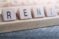 Closeup Of The Word Rent Formed By Wooden Blocks In A Type Case Royalty Free Stock Photo